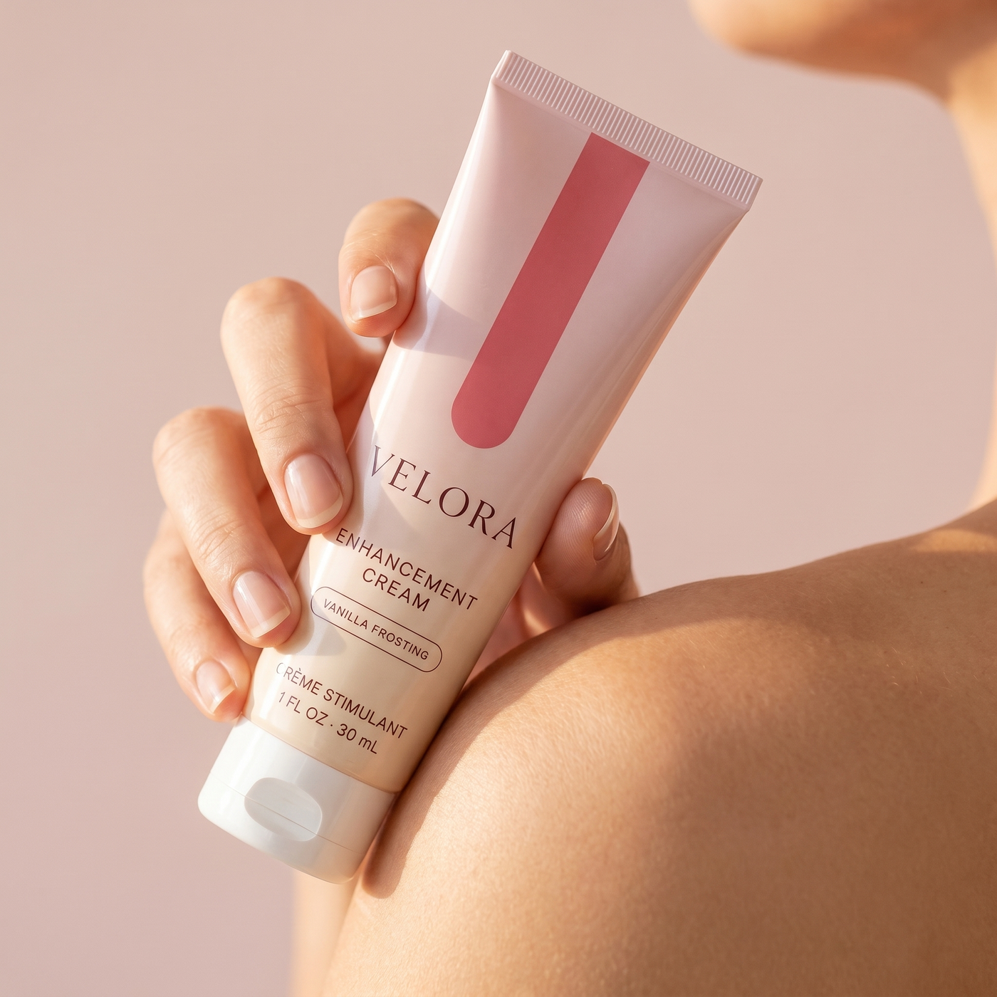 Hand holding Velora tube